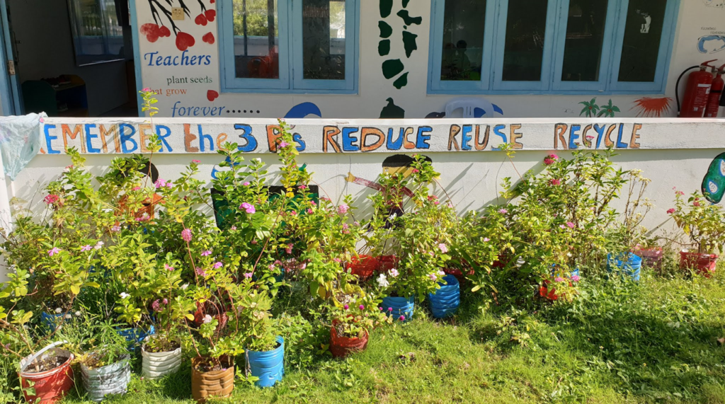 school garden with sustainability signage